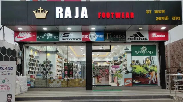 Raja Footwear showroom on Main Road Tali, Waidhan, lit up in the evening