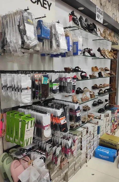 Socks, shoe care and footwear accessories stand