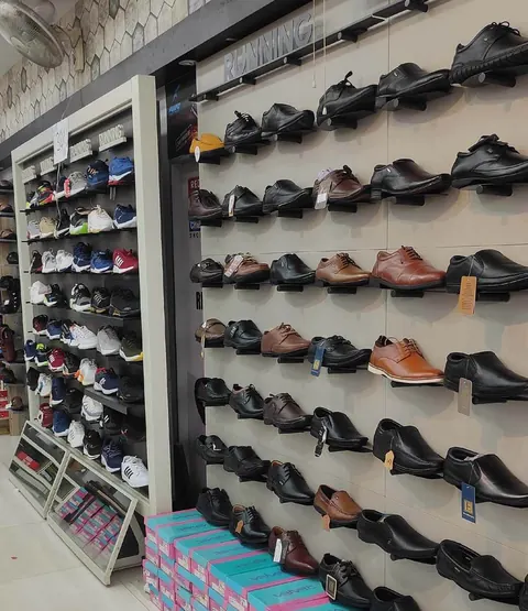 Men's formal shoe wall inside the Raja Footwear showroom