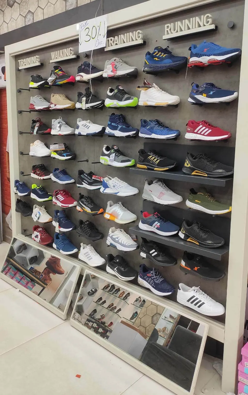 Sports and running shoe wall at Raja Footwear, Waidhan