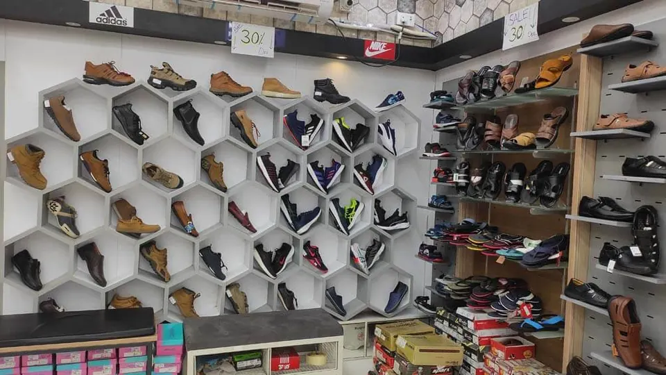 Hexagon display of sports shoes and sneakers in the Singrauli showroom