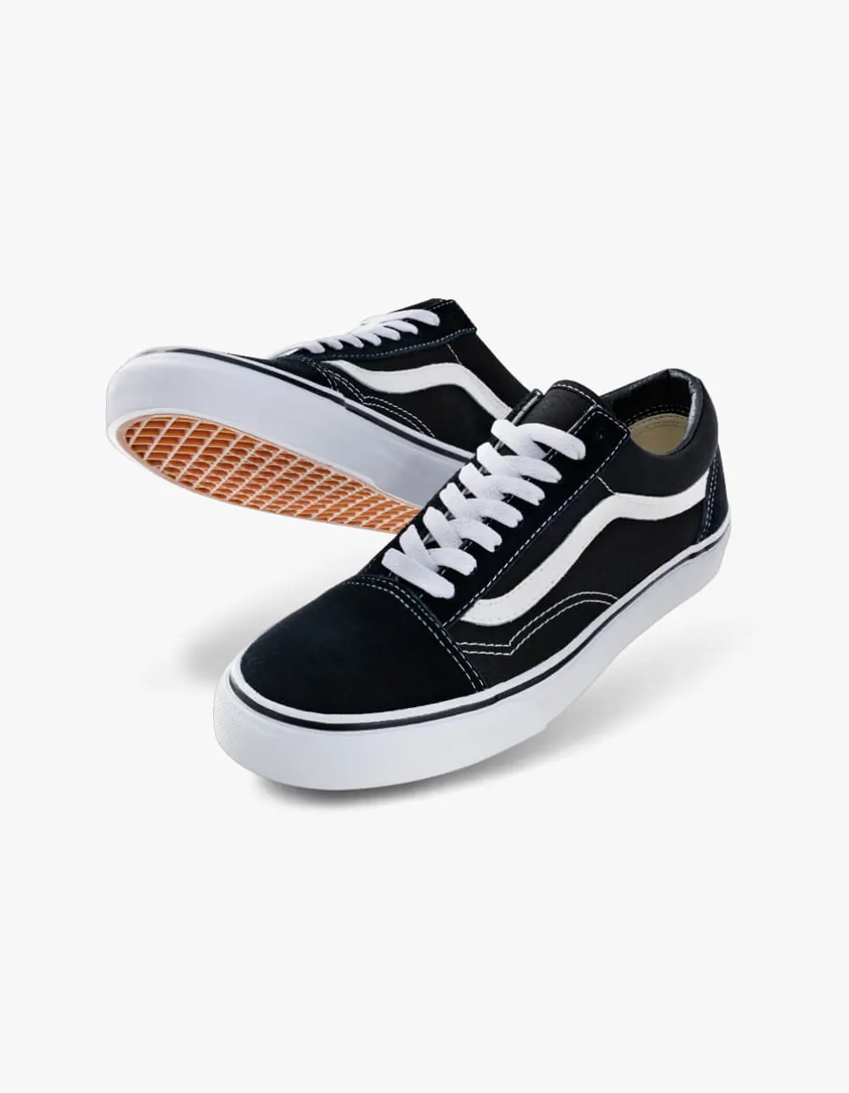 Black and white canvas sneakers for older students